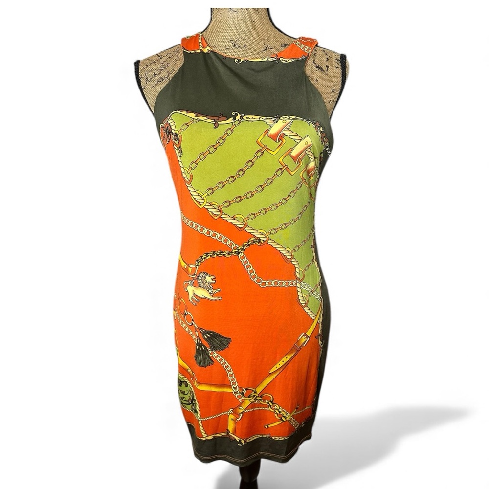 2B Bebe sleeveless dress with a multi-color chain and lion print.